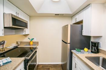 the preserve at ballantyne commons apartment kitchen with stainless steel appliances